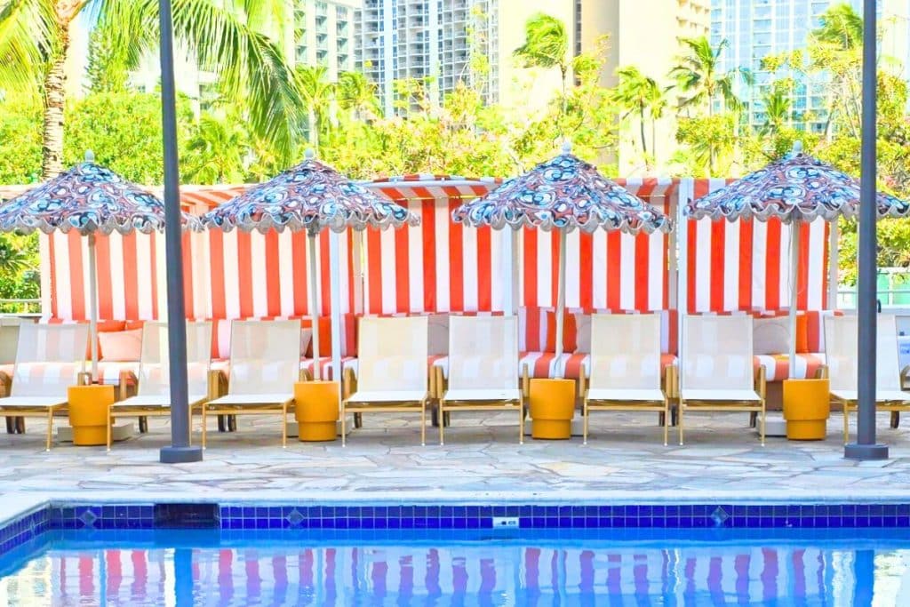Colorful striped pool chairs at Waikiki's Romer Ambassador